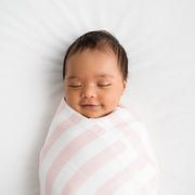 Pink bamboo baby blanket swaddle wrapped